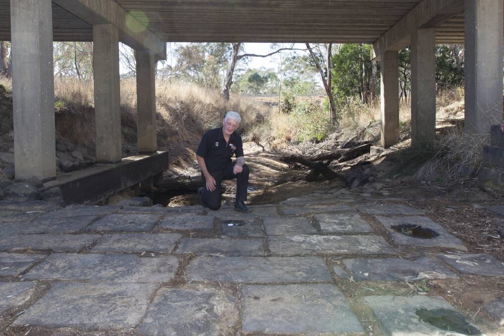 Roy Trimble at the discovery of Ford underneath the Dobie Bridge on the Western Freeway near Ararat. Picture: Peter Pickering