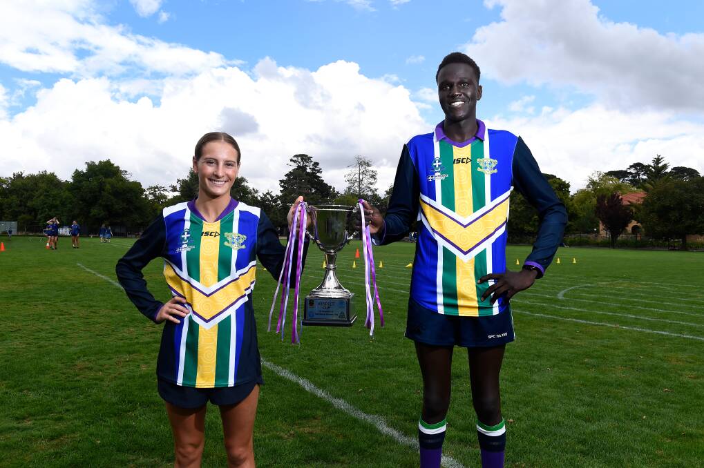 Charlee Hill of Loreto College and Deng Luil of St. Patrick's College are preapring for the Respect Cup which will be played at City Oval on Wednesday. Picture: Adam Trafford