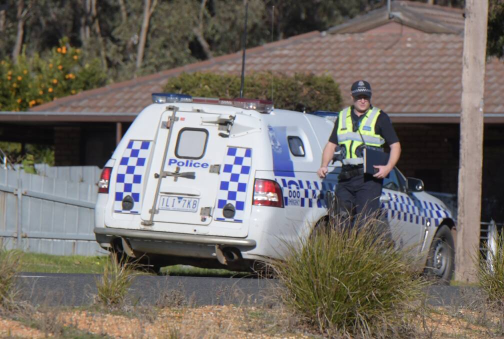 Police in Maryborough the day John Bourke's body was found, in July 2018. Picture: NONI HYETT