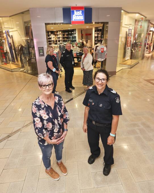 COMMUNITY APPROACH: Just Jeans sales assistant Deb Viccars, Acting Sergeant Mel Peters (front) with Stockland Wendouree facilities manager Ellie Beer, Acting Senior Sergeant Paul Allen and Stockland Wendouree centre manager Stevie Wright. Photo: Luke Hemer