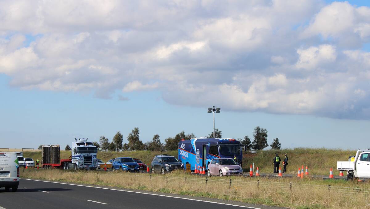 CHECKS: Cars were filtered into one lane at the check point near Bacchus Marsh. Photos: Hayley Elg