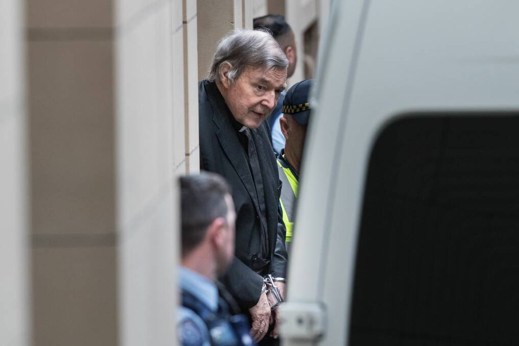 George Pell leaving court