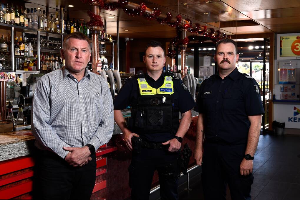 BE RESPONSIBLE: Dave Canny of the Red Lion Hotel, with Ballarat Police's First Constable Cole Harris, and Acting Sergeant Matthew Rhodes. Photo: Adam Trafford
