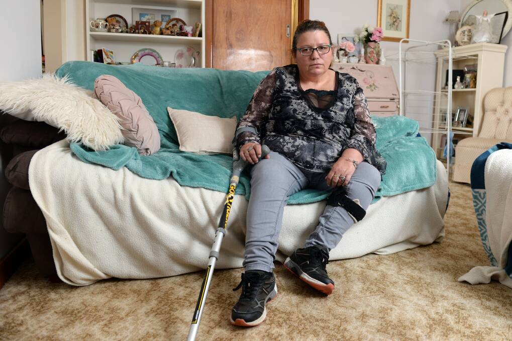 INJURED AT WORK: Jennifer Bearham has had to fight to keep her support from WorkCover. Photo: Kate Healy