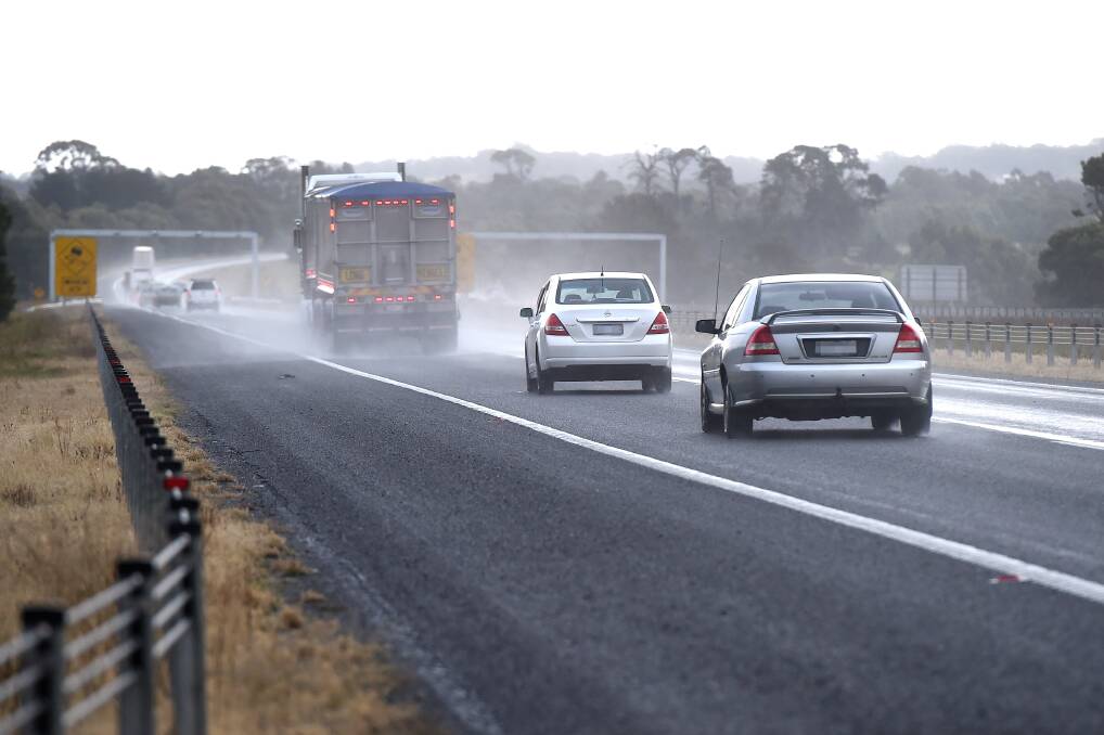 SLOW DOWN: Always drive to the conditions in wet weather. Photo: Adam Trafford