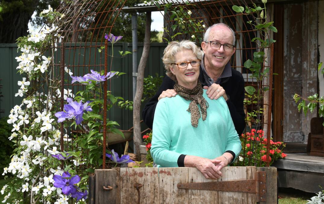 BLOOMING: Creswick's Vention Cottage owners Claire and Clive Chadder. Photo: Lachlan Bence