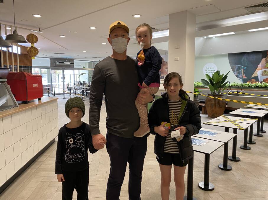 Daniel Rowe with children Charlie, Jack and Finley. 