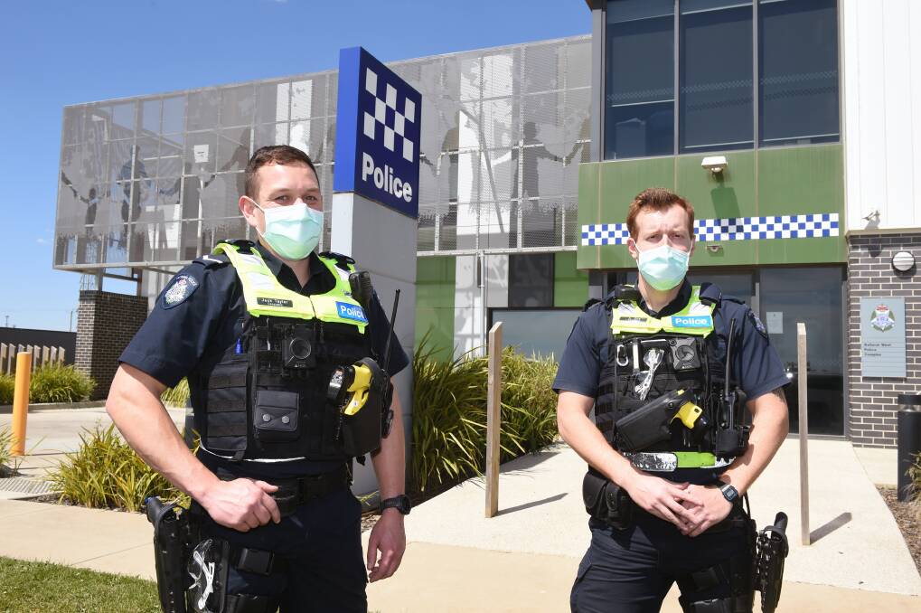Frontline: Constable Jack Taylor and Constable Andrew Pha have been working Sentinel shifts. Photo: Kate Healy