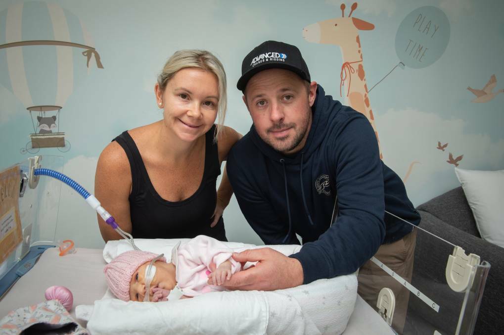 LOVE: Emma Tuddenham with husband Adam and baby Bella. Photos: Jill Mitchell for the Heartfelt Foundation