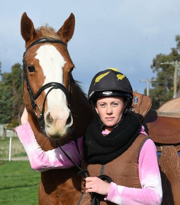 TEAM: 8-year-old mare Star with Clunes resident and horse trainer Emily Mau. Photo: Lachlan Bence