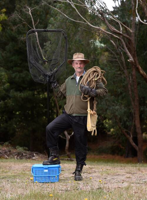 Wildlife rescuer Michael Sari with some of his equipment