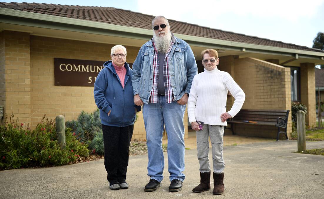 UNHAPPY: Residents living in the Moore Street public housing complex, Maureen Coppick, Andrew Aiden and Doreen Paulke want the Department of Health and Human Services to adhere to its duty of care. Photo: Dylan Burns