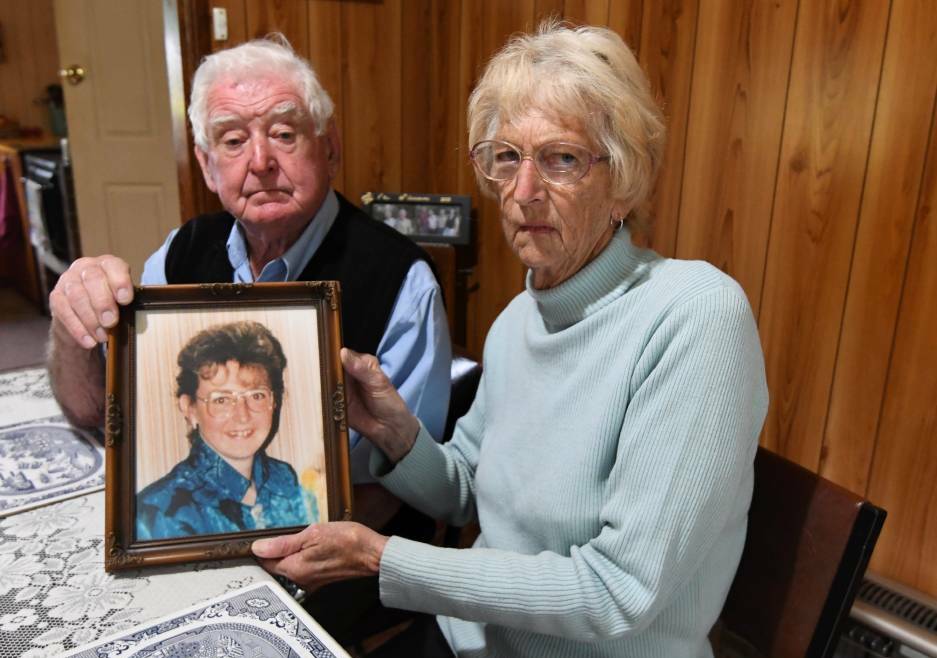 Spike and Ann Jones with a photo of their daughter Nina. Photo: Lachlan Bence