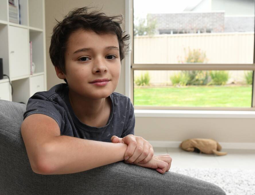 BRAVE: 10-year-old Lewis Wilson has a genetic heart condition. Photo: Lachlan Bence