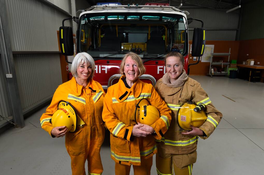 WOMEN: Indre Kisonas, Daylesford Brigade firefighter, with Margret Lockwood of the Glenlyon Brigade and chair of the District 15 Women's Reference Group and Kayla Manning, firefighter and crew leader at Daylesford Brigade. Photo: Adam Trafford
