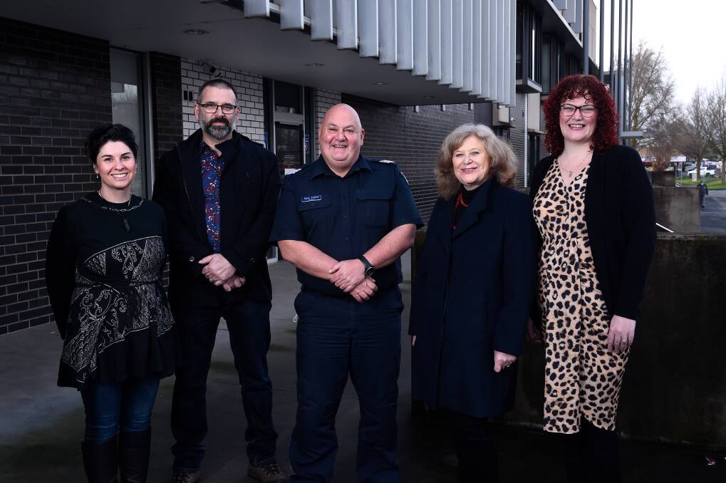 GOOD CAUSE: Twin Hearts committee member Tam Jones, Community Relations Officer Craig Austin, Sergeant Dave Collins, President Cops N Kids, with Twin Hearts Secretary Jackie Warner and President and Founder Kelly-Louise Austin. Photo: Adam Trafford