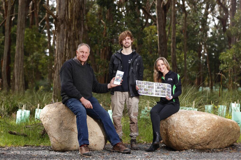 LEARNING TOOL: Bob Hartmann, Joel Ellis and Bianca Fammartino with the Indigenous Plants of Southern Ballarat" Wildflower brochure they helped produce. Photo: Luke Hemer