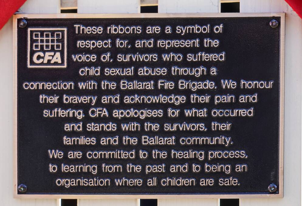 PLAQUE: The plaque has been installed alongside the ribbons.