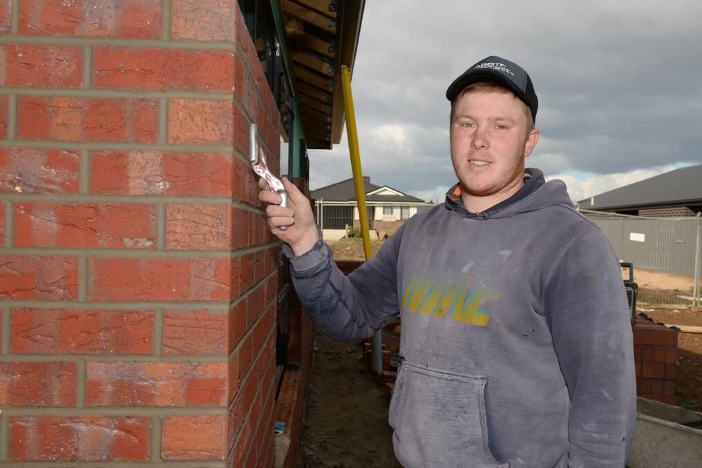 SKILLS: Paul Coon was working on a home in Alfredton before he set off to train in Russia. Photo: Kate Healy