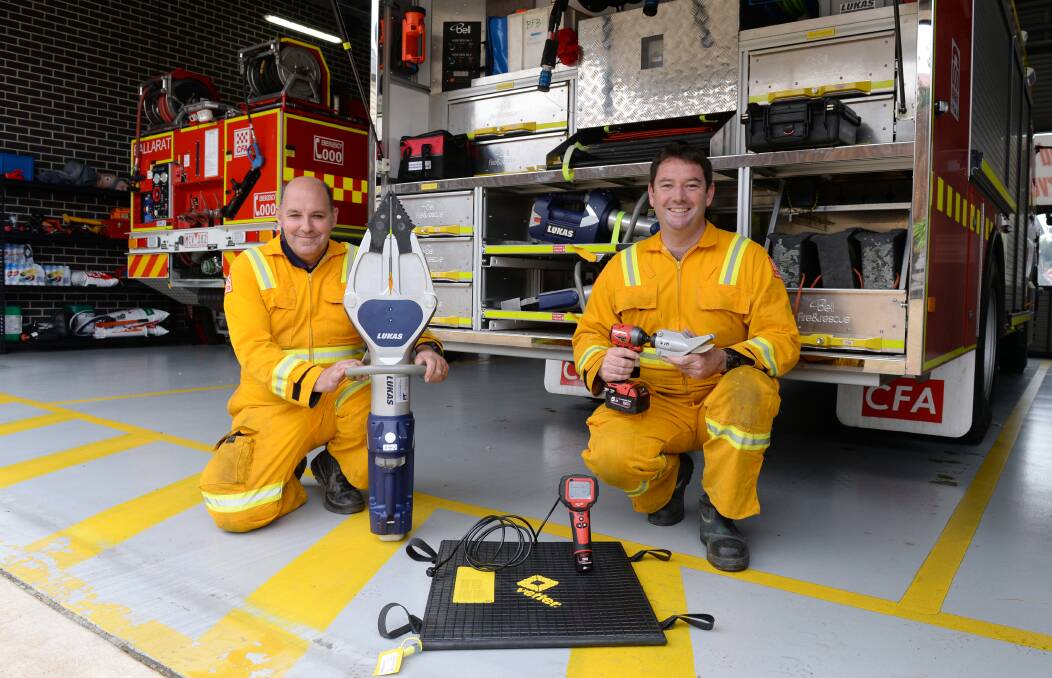 NEW TOOLS: Ballarat Fire Brigade's Captain Mark Cartledge and Damien Scott with the new equipment. Photo: Kate Healy