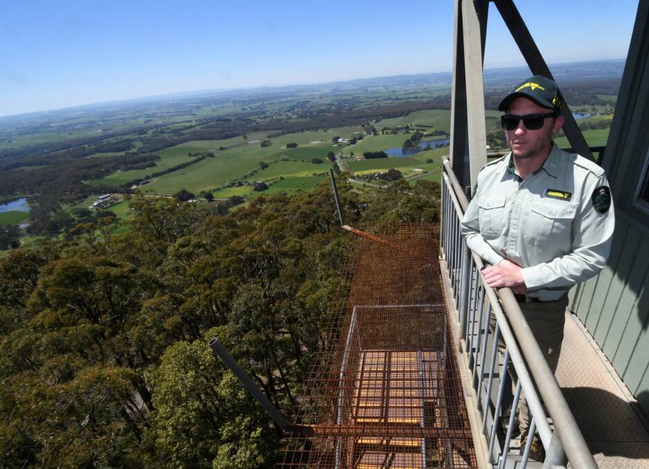 FFMV's Chris Arnold at the top of the Mt Buninyong fire tower. Photo: Lachlan Bence