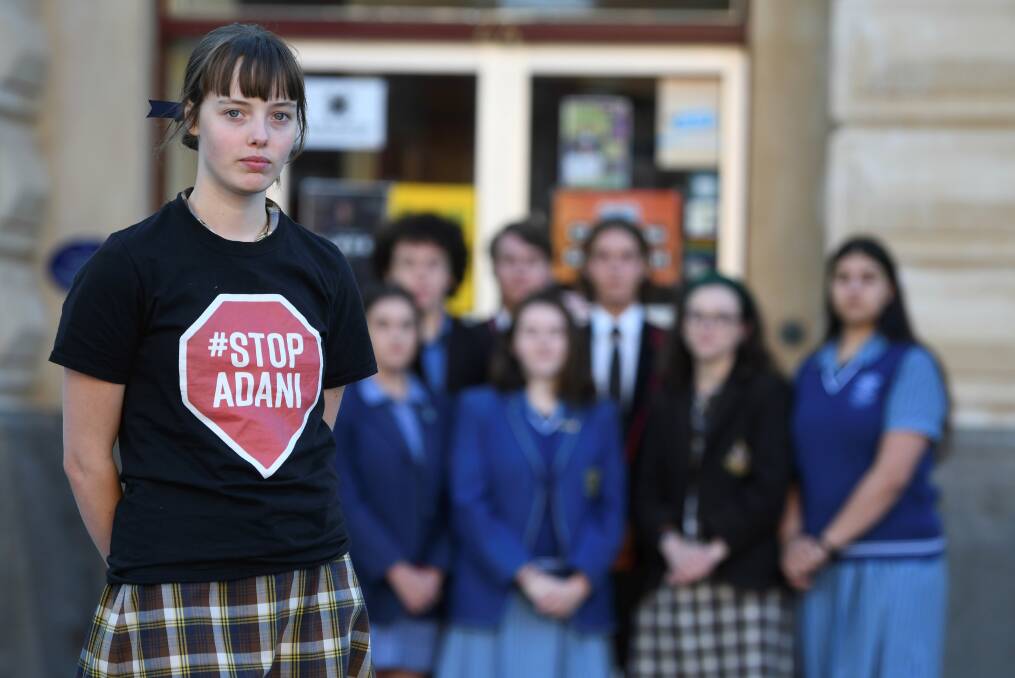 WORRIED: Ellie Fenton and other student activists prepare for next week's protest. Photo: Lachlan Bence