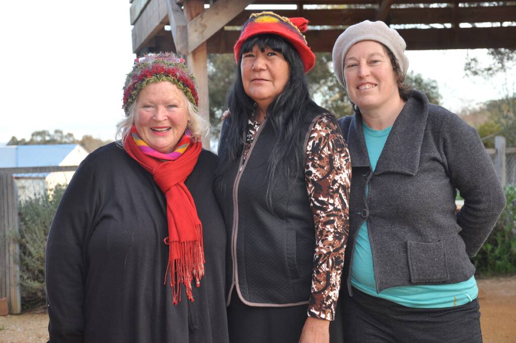 Aunty Marilyne Nicholls (centre) at an event to teach Indigenous weaving practices to the community in 2018.