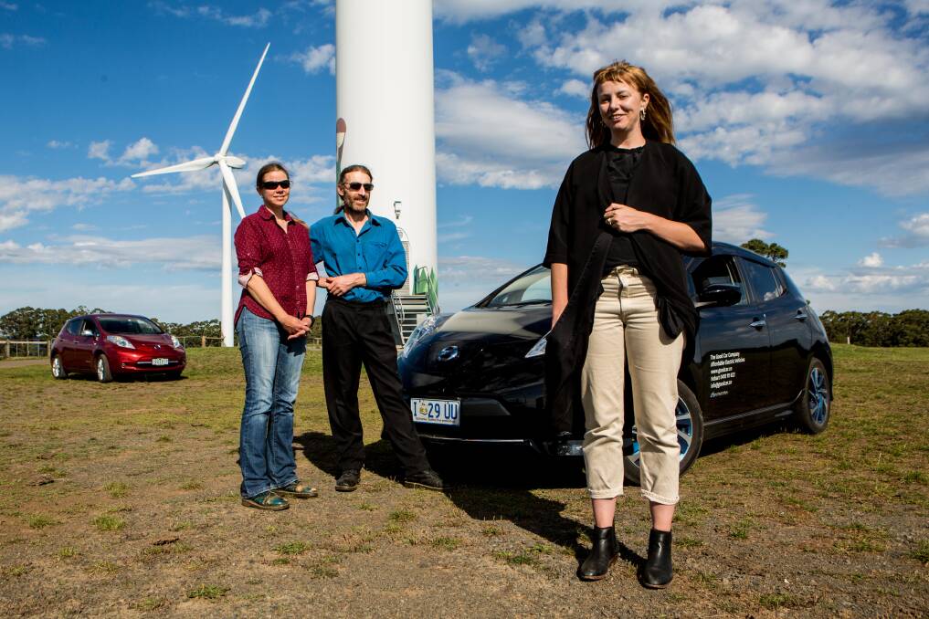 LAUNCH: Local electric vehicle owners Cherilyn Fuhlbohm and Craig Sitch with Hepburn Wind's Taryn Lane. Photo: Anthony Broese van Groenou 