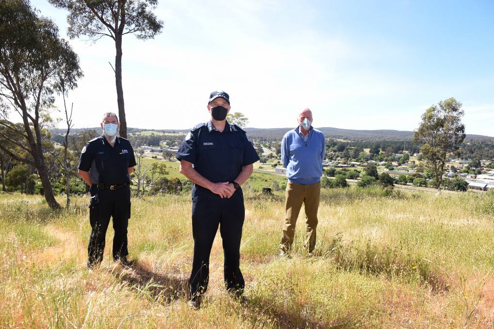 WARNING: Assistant Chief Fire Officer for District 16, Bernie Fradd with Assistant Commissioner Michael Grainger and farmer Don Robertson. Photo: Kate Healy
