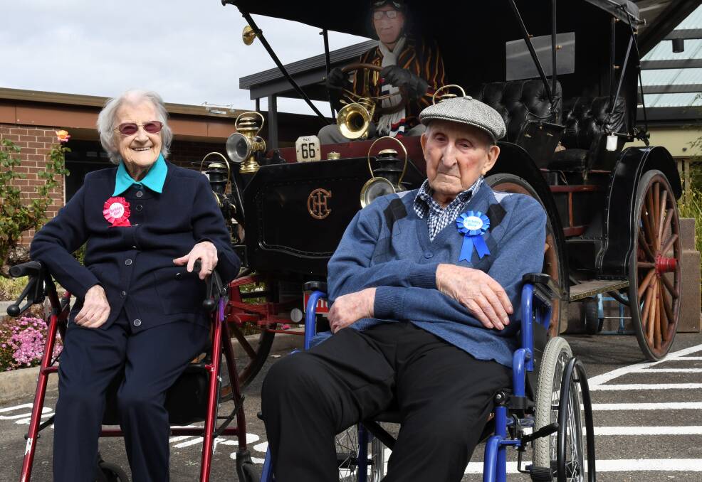 CELEBRATION: John Curtin Aged Care residents: owner of the rare 108-year-old buggy Ron Clarke with 106-year-old Marie Lewis and 103-year-old Nichol Gervasoni. Photo: Lachlan Bence
