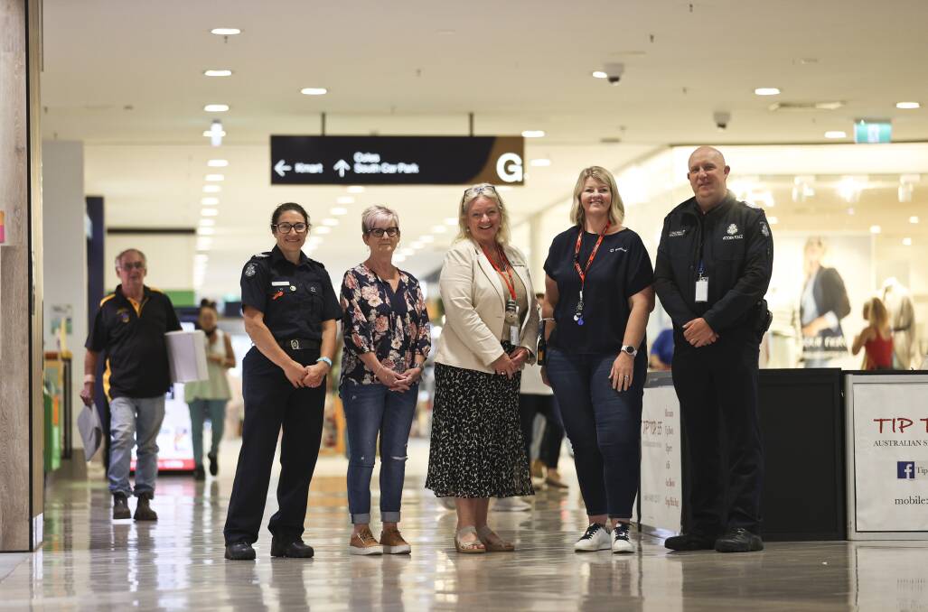 COLLABORATION: Acting sergeant Mel Peters with Just Jeans sales assistant Deb Viccars, Stockland Wendouree centre manager Stevie Wright, Stockland Wendouree facilities manager Ellie Beer and Acting Senior Sergeant Paul Allen. Photo: Luke Hemer