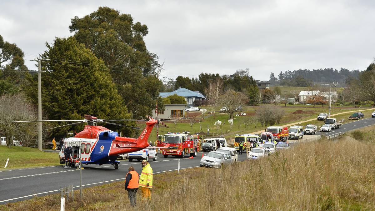 CRASH SCENE: An air ambulance, multiple police vehicles and several fire engines descended on the scene of the crash on the usually quiet section of Daylesford-Malmsbury road at Coomoora on Friday morning. Photo: Dylan Burns
