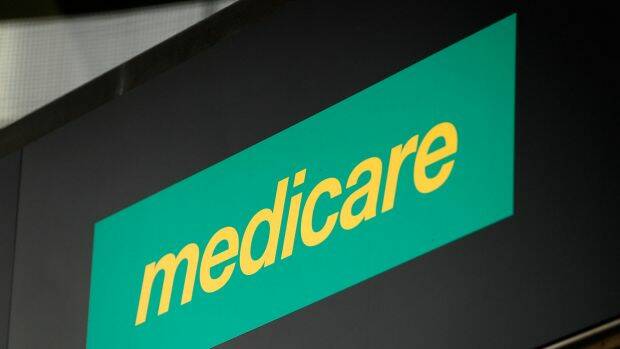 The budget includes $1 billion to "unfreeze" Medicare rebate payments from July 1, to ease doctors' fee hikes. Photo: Brendon Thorne.