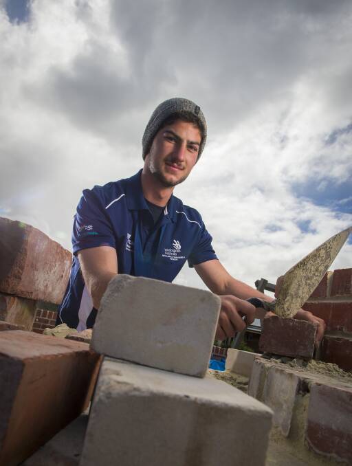 BRICKLAYER CHAMPION: Trystan Sammut is celebrating his gold medal win after competing in the WorldSkills Australia National Competition. Picture: Luka Kauzlaric