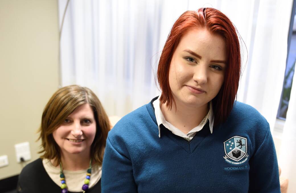 Hope: Sophie Lyons, 15, and her mother Fiona credit Berry Street's Navigators Program with getting her back to school after she began suffering debilitating panic attacks. Picture: Lachlan Bence. 