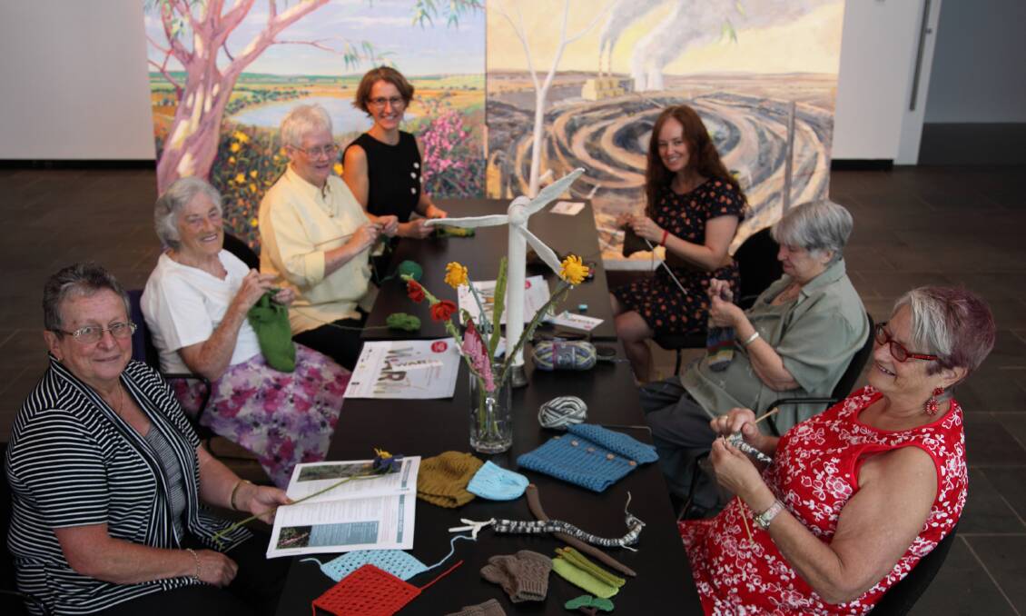 Knitters: Marion Wardlaw, Faye Luke, Peta Melbin and SEAM co-director Lisa Kendall knitting for the textile art project WARM which opens this week.