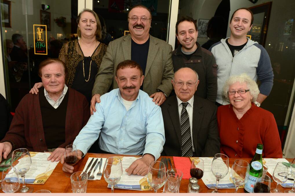 The Faustini family celebrate 40 years of Eureka Pizza.  Back: Gerda Faustini, John Faustini, Leon Faustini and Lawrence Faustini. Front: Alfonso Pino, Lucio Tarquinio, Charlie Tarquinio and Margaret Tarquinio.