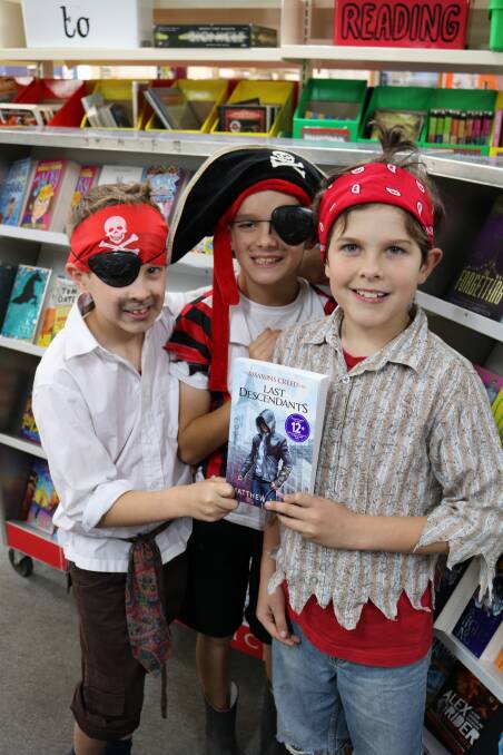 Books and pirates: Ballarat Christian College year 4 students Samuel, Gibson and Adam dressed up for the Bookaneer Book Fair. Picture: Supplied.
