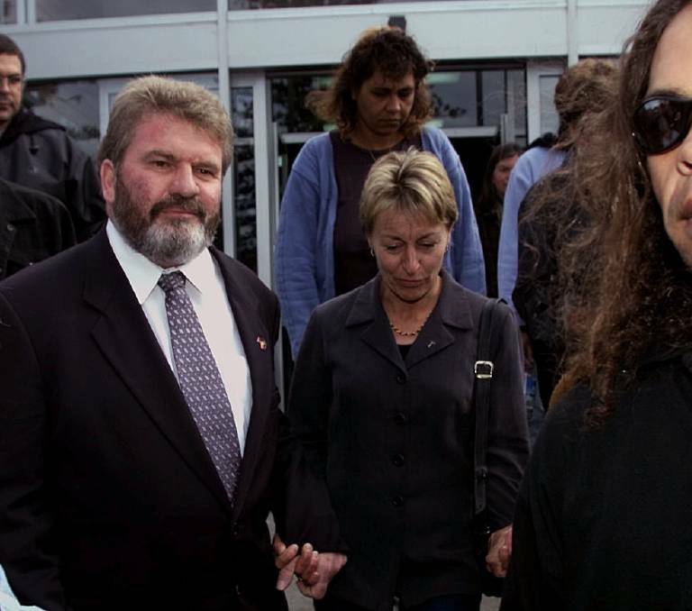 Geoff Clark, chairman of ATSIC appears at Warrnambool magistrates court on a bail application for a rape charge from 1981. Seen here leaving the court with his wife Trudy.