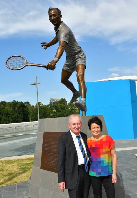 Rod Laver poses for a photo with Lis Johnson at Melbourne Park. Photo by Vince Caligiuri/Fairfax Media