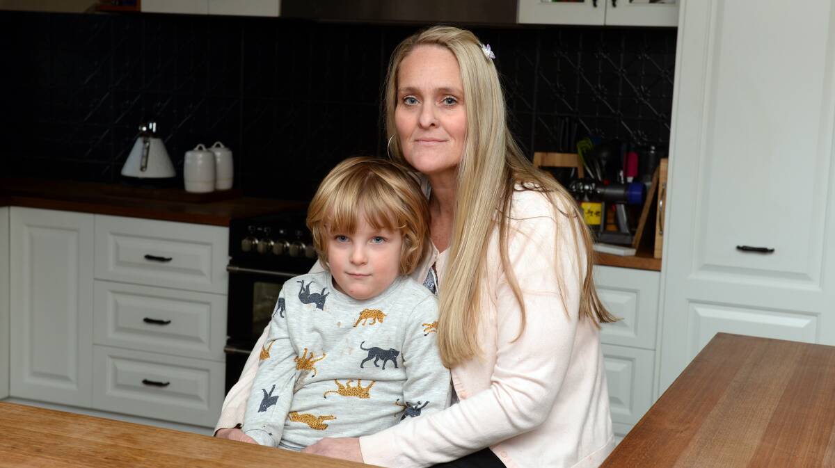 UNFAIR DEAL: Jo Hardy, with her four-year-old son Kale, has said the payment sent the wrong message about work put in by casual staff. Picture: Kate Healy. 