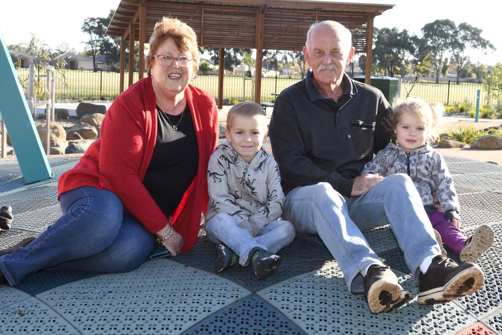 Annette and Ron Bedford, with four-year-old George and two-year old Emily. Picture: Lachlan Bence.