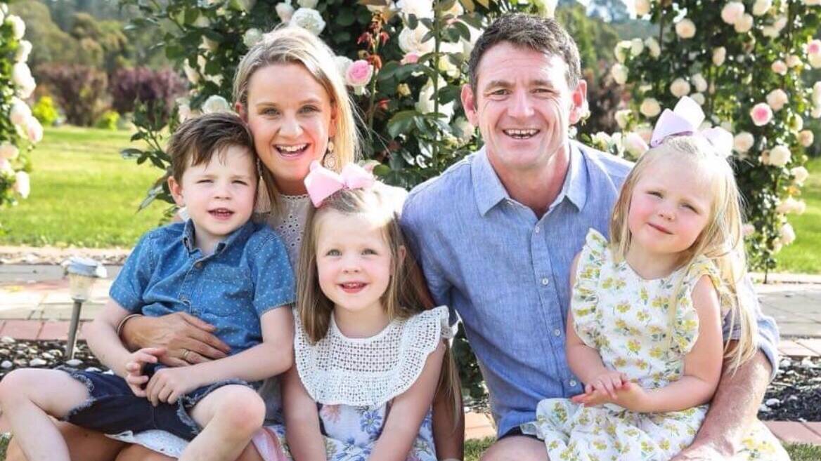 FAMILY MAN: Adam Jenkins with partner Angie and their three young children