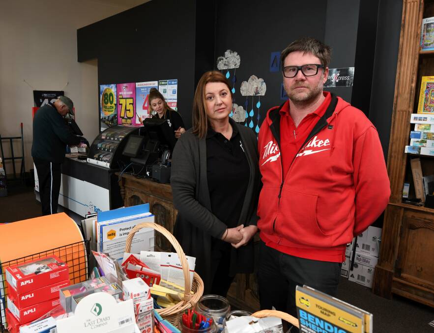 CRIME VICTIMS: Cynthia and Craig Drewer are struggling to keep their Clunes newsagency business afloat after being hit by a brazen criminal raid in March. Photo: Lachlan Bence.