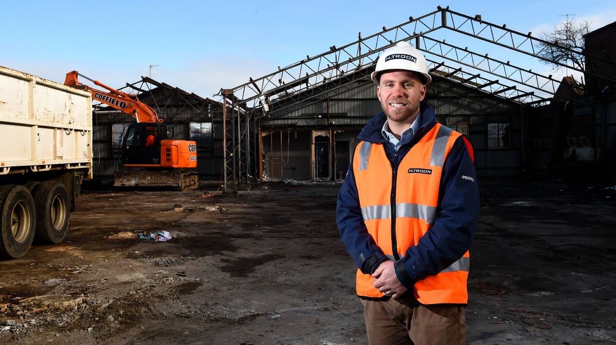 READY TO GO: James Troon, a director at local, family run construction firm H. Troon, says he is excited to be working on the project, which is one of the first of its kind in Ballarat. Demolition of the existing warehouse is almost complete, with work due to start in August. Picture: Adam Trafford. 