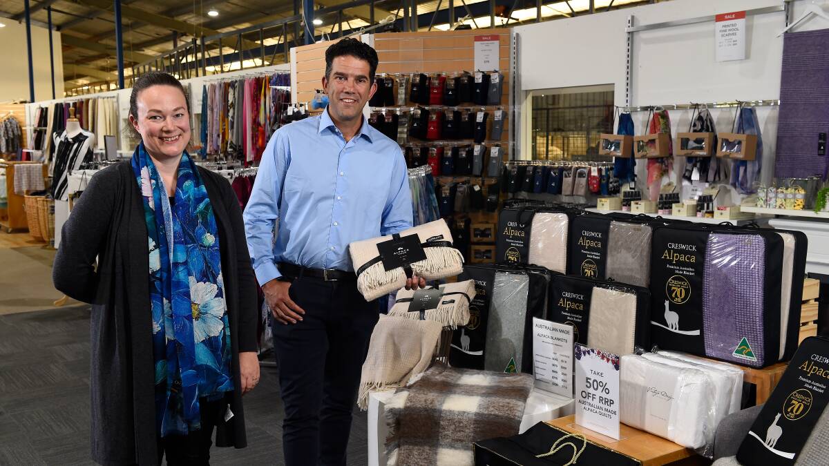 THANKFUL: Creswick Woollen Mills staff member Emma Matheson with Executive Director Boaz Herszfeld, who has expressed his gratitude for local support. Picture: Adam Trafford.