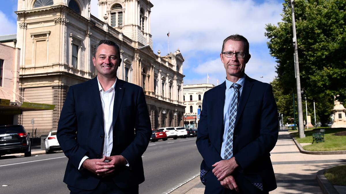NEW ERA: The mayor Cr Daniel Moloney and new CEO Evan King stand in front of town hall on the day Mr King was confirmed in the role last month. Picture: Adam Trafford. 