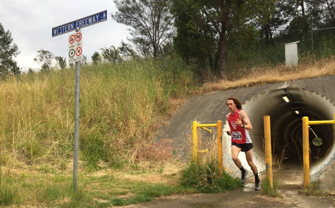 Jayden Wallis emerges from the Western Freeway tunnel, comfortably in front. 
