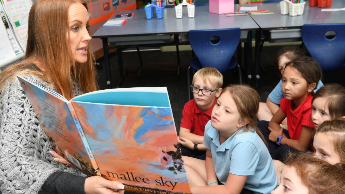 ALL BOOKED UP: Jodi Toering reads her new children's book to students at Forest Street Primary School in Wendouree. Picture: Lachlan Bence.