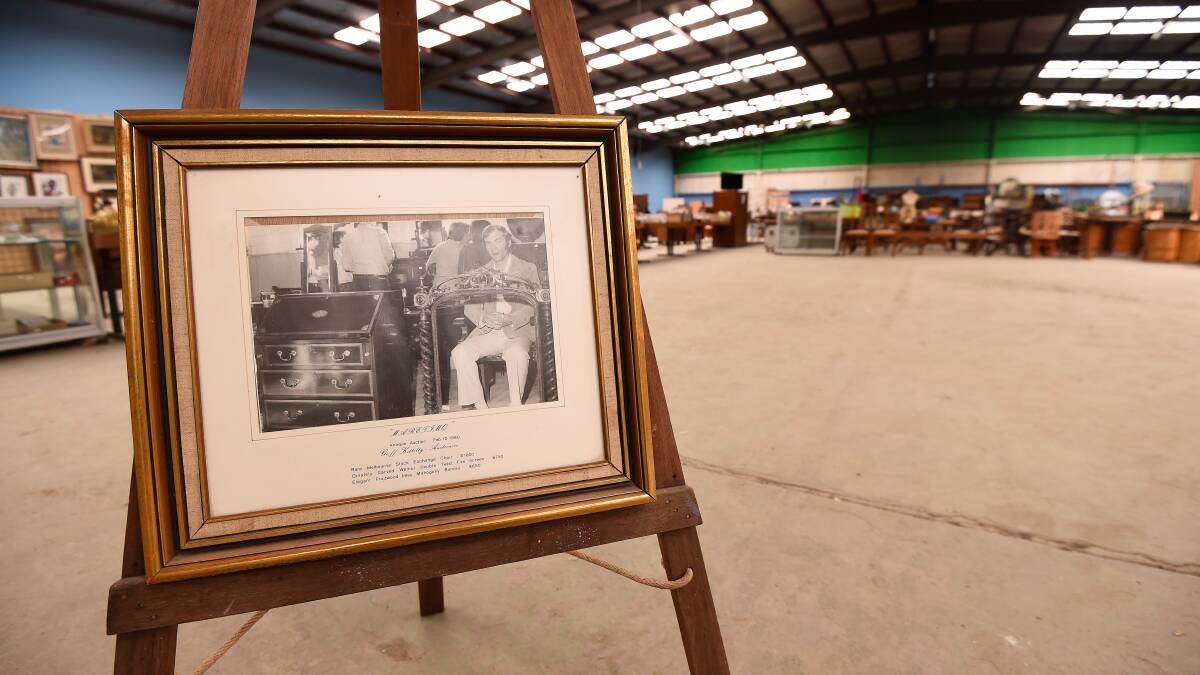 A portrait of the Kittelty's Auction Rooms founder, Geoff Kittelty, on display. Picture: Adam Trafford. 